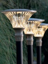 Lampada da esterno in alluminio pressofuso, diffusore trasparente, diametro 60mm, altezza max 160mm, IP65 tortora